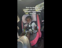 Little girl smears yogurt on face like lotion