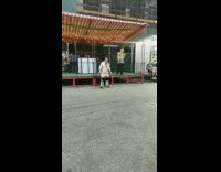 One guy sings on stage while other dances 