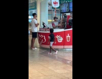 Man shoves half of ice cream into mouth
