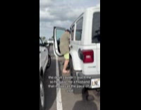 Man moves slowly at the parking lot