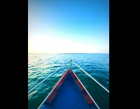 Boat Whirrs Loudly as it Travels on Sea