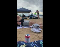 Black bathing suit girl beach blue canopy 