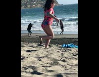 Woman black and red bikini dance around beach Part 1