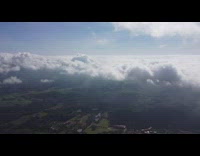 Drone fly show view above clouds sunlight
