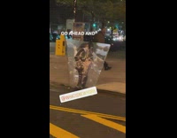 Guy Wears Big Plastic Bag Around Himself 