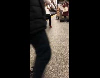 Guy winds hand and opens fanny pack in subway train while saying random stuff