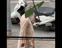 Man wear plastic bag instead of mask