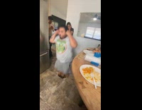Guy jumps hole in kitchen floor