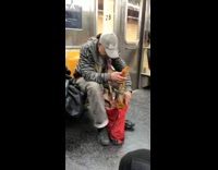 man with live lobster on train
