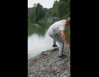 Stone thrown and bounces again on the water