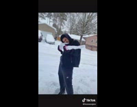 Dad builds himself as snowman 