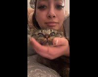 Collab Clips_MPUGC2 - Woman giving her pet cat kisses on forehead 