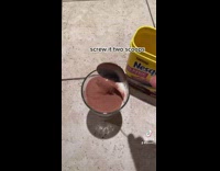 Collab BitchIG2 - Pouring scoops of nesquick into milk cup
