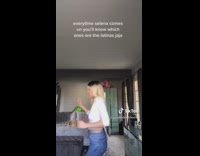 White shirt girl dances brown dog bed