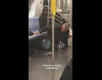 old man on floor empty alcohol bottle