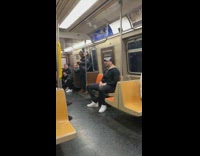 Group of people singing Sam Smith on train subway