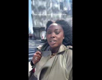 Woman encounters strong winds at New York 