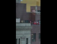Guys Santa costume practice dance at rooftop