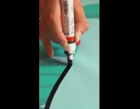 Man use black marker draw outline artwork