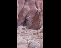 Girl lean backwards pose at canyon walls