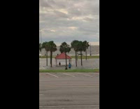 Girl swim flood red roof windy lake