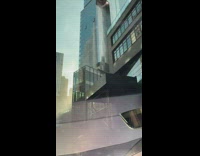 Water falls from skyscraper window 
