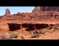 Collab IITW - Woman in white dress run towards the cliff at the monument valley