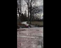 Santa sitting on bench plays white accordion 