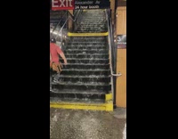 Water flows down subway station stairs fail 