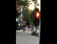 Guy rides bike carries sofa at back