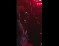 Guy stands on table booth in restaurant