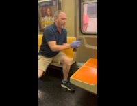 Collab winy - Man with gloves removes pigeon in train