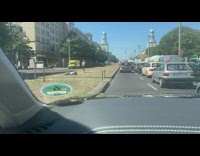 Black pants guy yoga pose road divider 