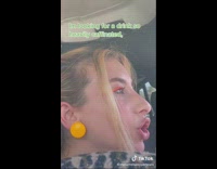 Lady orders bottled water drive thru car 