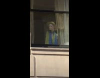 a mannequin looking out the window