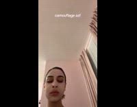 Womans facemask blends to wall color 