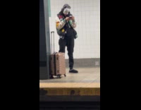 Teen wearing phantom of the opera mask