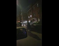 Guy rides chair on electric scooter 