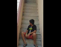 Kid does bottle flip backwards on stairs 