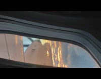 Plane window show engine clouds and sunset