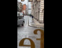 Woman selfie video outside the windy sidewalk
