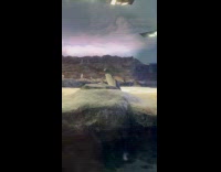 Penguin walking near glass wall enclosure