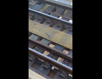 Toy dagger sword knife on metro train tracks 