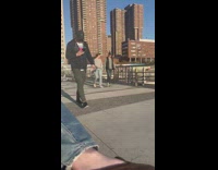 Guy walking on bridge with autonomous segway