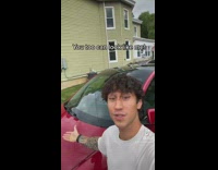 Guy has lightning mcqueen windshield cover for tesla 