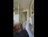 Girl in bathroom runs into shower door fail 