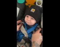 Baby making popping noises copying dad 