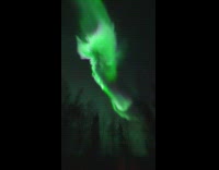 Collab WeirdM - Huge bright aurora borealis on night sky