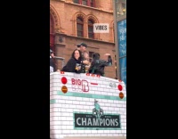 Crowd parties on top of the bus