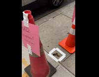 Traffic cones surround poop left by bad neighbor 